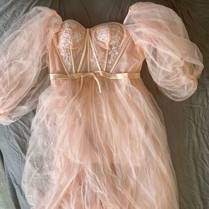 Nude-ish blush ball gown with corset and silk inner garment. Tulle ballgown